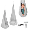 A collage of images showing a child in a hanging chair, the hanging chair itself, and mounting hardware. Podgląd zdjęcia produktu