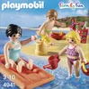 Playmobil figures on a beach playing with sand toys and a watering can. Anteprima dell’immagine prodotto