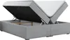A boxspring bed with its storage compartment open, revealing the interior. The bed is upholstered in light gray fabric. Produktbild-Vorschau