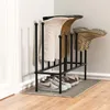 A corner of a room with a boot rack holding several pairs of boots and shoes. Produktbild-Vorschau