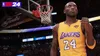 A digital rendering of a basketball player in a Lakers uniform, with a basketball hoop and arena in the background. Produktbild-Vorschau