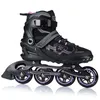 A black and purple inline skate is shown against a white background. Voir les images du produit