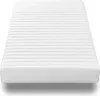 A white mattress with horizontal lines is shown from a diagonal angle. Produktbild-Vorschau