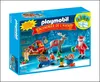A Playmobil advent calendar box featuring Santa Claus, a reindeer, a sleigh, and elves preparing gifts in a snowy scene. Produktbild-Vorschau
