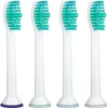 Four toothbrush heads are lined up against a white background. Produktbild-Vorschau