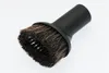 A close-up studio shot of a vacuum cleaner brush attachment. Produktbild-Vorschau