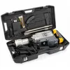 A heavy-duty demolition hammer and its accessories are neatly arranged inside a black carrying case. Náhled obrázku produktu