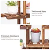 Close-up shots of a wooden plant stand with potted plants, highlighting its features. Anteprima dell’immagine prodotto