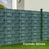 A green fence with a stone-like pattern is shown in a garden setting. Náhled obrázku produktu