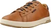 A single brown Skechers sneaker is shown from a side-angle on a white background. Anteprima dell’immagine prodotto