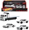 A Hot Wheels Premium Nissan Collector Set with a tow truck and several Nissan Skyline models displayed in packaging. Anteprima dell’immagine prodotto