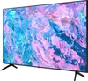 A side view of a modern flat-screen television with a colorful abstract image displayed on its screen, resting on its stand. Produktbild-Vorschau