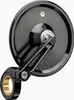A black motorcycle handlebar end mirror with a gold insert, shown against a white background. Náhled obrázku produktu