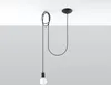 A black pendant light with a light bulb hanging from a cord against a white and gray background. Anteprima dell’immagine prodotto