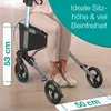 A person is sitting on a rollator walker, demonstrating its use as a seat. Dimensions are indicated with text overlays. Produktbild-Vorschau
