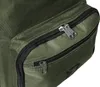 A close-up view of the zippers on a green bag. Náhled obrázku produktu