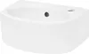 A white ceramic washbasin is shown from a slightly elevated angle against a white background. Podgląd zdjęcia produktu
