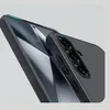 Close-up of a black phone case with a textured back and camera bump, placed diagonally on a light gray background. Produktbild-Vorschau