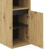 A close-up view of a wooden cabinet with an open door, revealing shelves inside. Náhled obrázku produktu