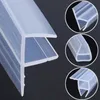 A close-up of a transparent shower door seal and three circular insets showing different profiles of shower door seals. Náhľad obrázku produktu
