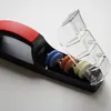 A knife sharpener with its transparent lid open, showing three sharpening wheels. Náhled obrázku produktu