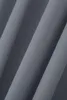 A close-up view of gray fabric with folds and shadows. Produktbild-Vorschau