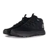 A pair of black Timberland boots on a white background. Voir les images du produit