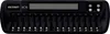 A black battery charger with multiple slots for batteries. Produktbild-Vorschau
