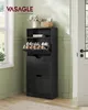 A black shoe cabinet with shoes on display, placed in a room with light green walls and a white door. Produktbild-Vorschau
