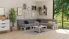 A living room scene with a sectional sofa made of pallet cushions, a coffee table, and decorative items. Voir les images du produit