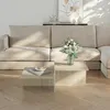 A modern living room scene with a couch and a coffee table. Náhled obrázku produktu