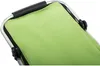 A close-up view of the top handle and green fabric of a shopping or picnic basket. Náhled obrázku produktu