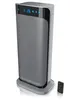 A tall, modern ceramic heater with a digital display and a remote control. Produktbild-Vorschau