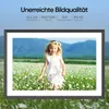 A digital photo frame displaying a young girl in a field of flowers, with text overlays describing the product's features. Produktbild-Vorschau