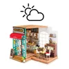 A miniature model of a coffee shop called Simon's Coffee. Anteprima dell’immagine prodotto