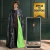 A young man wearing a costume cape is shown, with a smartphone displaying a trick where his body appears to disappear. Náhľad obrázku produktu
