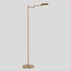 A floor lamp with an adjustable arm and a rectangular shade. Produktbild-Vorschau
