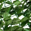 A close-up view of artificial ivy leaves attached to a green wire mesh. Voir les images du produit
