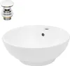 A white ceramic sink and a drain assembly are shown against a white background. Náhled obrázku produktu