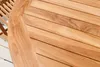 A close-up view of a wooden garden table made of teak slats, with a curved edge. Produktbild-Vorschau