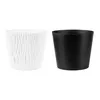 Two plant pots, one white with a textured surface and one black, are shown side-by-side against a white background. Anteprima dell’immagine prodotto