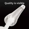 A close-up of a white plastic pump dispenser nozzle against a black background. Produktbild-Vorschau