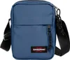 A blue Eastpak shoulder bag is shown against a white background.