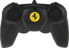 A black remote control with a yellow Ferrari logo. Produktbild-Vorschau