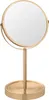 A gold-colored makeup mirror on a stand. Produktbild-Vorschau