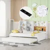 A child's bedroom with a white bed frame, trundle bed, and a headboard with shelves and a corkboard. Produktbild-Vorschau