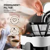 A close-up shot of a coffee machine filter basket being held by a hand, with a blurred background of people enjoying coffee. Náhľad obrázku produktu
