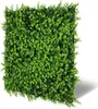 A square panel of artificial green foliage, likely for wall decoration or soundproofing, is shown against a white background. Produktbild-Vorschau