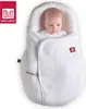 A baby wrapped in a white cocoon-like blanket. Anteprima dell’immagine prodotto