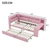 A pink daybed with a pull-out trundle bed, showing dimensions in centimeters. Náhľad obrázku produktu